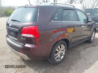 2012 Kia Sorento SX with VIN 5XYKW4A2XCG187647, listed as a IAAI auction lot 42020667 with 210,689 mi miles. Bid and sale history available at carsss.com. Image 4.