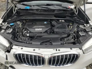 2017 BMW X1 xDrive28i with VIN WBXHT3C38H5F70088, listed as a Copart auction lot 50447715 with 119,649 mi miles and Clean Title. Bid and sale history available at carsss.com. Image 12.