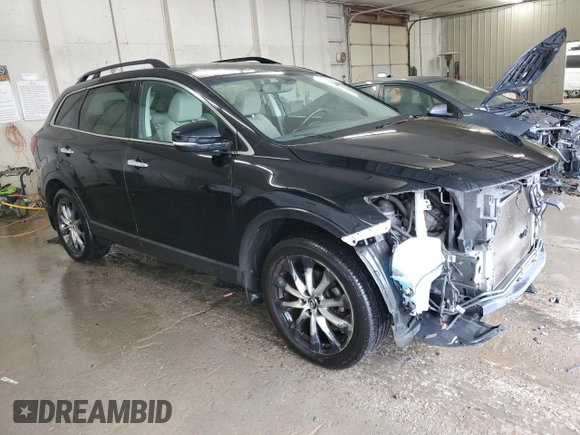 2014 Mazda CX-9 Grand Touring with VIN JM3TB3DA7E0439741, listed as a Copart auction lot 58908805 with 170,604 mi miles and Salvage title. Bid and sale history available at DreamBid. Image 4.