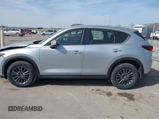 2019 Mazda CX-5 Sport with VIN JM3KFBBM6K1582760, listed as a IAAI auction lot 41822152 with 60,620 mi miles and . Bid and sale history available at DreamBid. Image 14.