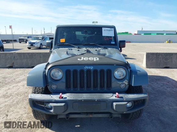 2015 Jeep Wrangler Unlimited Rubicon with VIN 1C4BJWFG7FL525724, listed as a IAAI auction lot 41394059 with 132,058 mi miles. Bid and sale history available at carsss.com. Image 13.