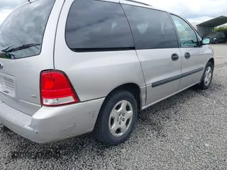 2004 Ford Freestar SE z VIN 2FMZA51664BA73569, wystawiony jako IAAI lot #39712844 z przebiegiem 182 013 mil mil oraz . Historia ofert i sprzedaży dostępna na DreamBid. Obrazek 17.