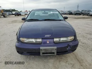 1996 Saturn SL with VIN 1G8ZK5278TZ255742, listed as a Copart auction lot 79050024 with 83,205 mi miles and Salvage title. Bid and sale history available at DreamBid. Image 5.