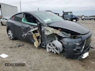 2024 Tesla Model Y с VIN 7SAYGDED1RF092027, выставлен на аукционе Copart как лот 51655485 с пробегом 22 010 миль миль и Списание • Salvage title. История ставок и продаж доступна на DreamBid. Изображение 4.