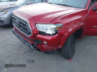 2020 Toyota Tacoma SR5 z VIN 3TMCZ5AN4LM364529, wystawiony jako IAAI lot #41267273 z przebiegiem 29 391 mil mil oraz . Historia ofert i sprzedaży dostępna na DreamBid. Obrazek 6.