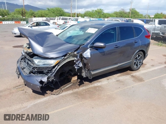 2018 Honda CR-V Touring with VIN 7FARW1H90JE030766, listed as a IAAI auction lot 41637900 with Not Provided miles and . Bid and sale history available at DreamBid. Image 2.