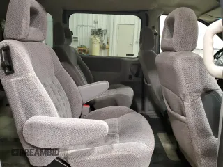 2000 Pontiac Montana z VIN 1GMDU03EXYD365251, wystawiony jako Copart lot #79131854 z przebiegiem 182 527 mil mil oraz Nie do naprawy • Non repairable. Historia ofert i sprzedaży dostępna na DreamBid. Obrazek 11.