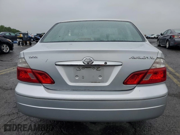 2004 Toyota Avalon XL z VIN 4T1BF28B94U380488, wystawiony jako Copart lot #57809445 z przebiegiem 103 078 mil mil oraz Szkoda całkowita • Salvage title. Historia ofert i sprzedaży dostępna na DreamBid. Obrazek 6.
