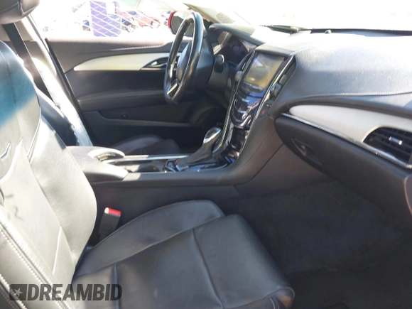 2014 Cadillac ATS Luxury AWD with VIN 1G6AH5RX0E0176647, listed as a IAAI auction lot 40939517 with 103,348 mi miles and . Bid and sale history available at DreamBid. Image 5.
