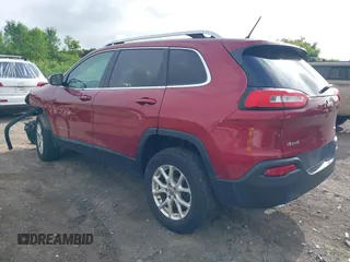 2015 Jeep Cherokee Latitude z VIN 1C4PJMCS0FW534959, wystawiony jako IAAI lot #42657381 z przebiegiem 114 577 mil mil oraz . Historia ofert i sprzedaży dostępna na DreamBid. Obrazek 3.
