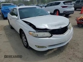 2002 Toyota Solara SE z VIN 2T1CE22P42C005554, wystawiony jako Copart lot #57756005 z przebiegiem 317 340 mil mil oraz Szkoda całkowita • Salvage title. Historia ofert i sprzedaży dostępna na DreamBid. Obrazek 14.