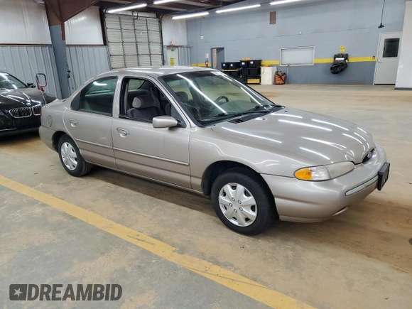 1995 Ford Contour LX with VIN 1FALP6531SK243263, listed as a Copart auction lot 50590725 with 105,347 mi miles and Salvage title. Bid and sale history available at DreamBid. Image 4.