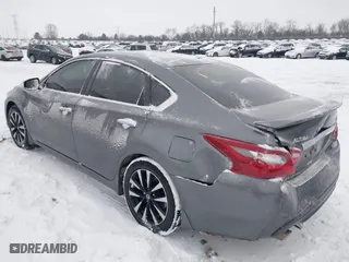2018 Nissan Altima 2.5 SV with VIN 1N4AL3AP0JC136949, listed as a IAAI auction lot 41572923 with 69,000 mi miles. Bid and sale history available at carsss.com. Image 3.