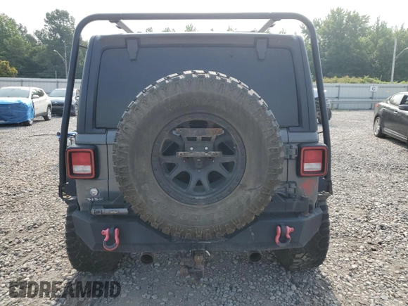 2018 Jeep Wrangler Unlimited Sport S with VIN 1C4HJXDG0JW281103, listed as a Copart auction lot 60400565 with 112,485 mi miles and Salvage title. Bid and sale history available at DreamBid. Image 6.