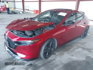 2021 Mazda 3 Premium Plus z VIN JM1BPBNY3M1332643, wystawiony jako IAAI lot #41536777 z przebiegiem 43 075 mil mil oraz . Historia ofert i sprzedaży dostępna na DreamBid. Obrazek 2.