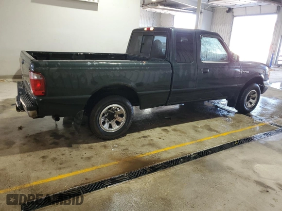 2001 Ford Ranger XLT Appearance with VIN 1FTYR14E71PA81740, listed as a Copart auction lot 48695975 with 203,450 mi miles and Salvage Title. Bid and sale history available at DreamBid. Image 3.