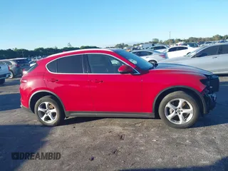 2018 Alfa Romeo Stelvio z VIN ZASFAKAN3J7C20066, wystawiony jako IAAI lot #40879859 z przebiegiem 50 131 mil mil oraz . Historia ofert i sprzedaży dostępna na DreamBid. Obrazek 14.