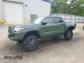 2021 Toyota Tacoma SR z VIN 3TYCZ5AN9MT010768, wystawiony jako Copart lot #53961455 z przebiegiem 55 822 mil mil oraz Szkoda całkowita • Salvage title. Historia ofert i sprzedaży dostępna na DreamBid. Obrazek 1.