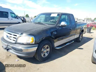 1999 Ford F-150 XL with VIN 2FTRX17L7XCA75886, listed as a IAAI auction lot 42831089 with Not provided miles and . Bid and sale history available at DreamBid. Image 2.