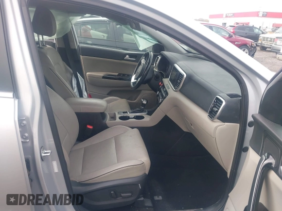 2020 Kia Sportage EX with VIN KNDPN3AC9L7775192, listed as a IAAI auction lot 41020011 with 60,652 mi miles and . Bid and sale history available at DreamBid. Image 5.