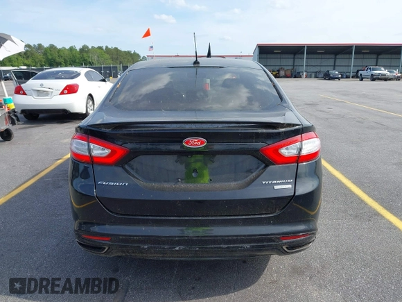 2016 Ford Fusion Titanium with VIN 3FA6P0K90GR179528, listed as a IAAI auction lot 42181213 with 230,264 mi miles. Bid and sale history available at carsss.com. Image 16.