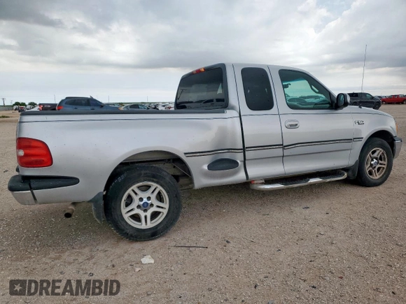 1999 Ford F-150 with VIN 1FTRX07W0XKB88434, listed as a Copart auction lot 60063135 with 277,188 mi miles and Salvage title. Bid and sale history available at DreamBid. Image 3.