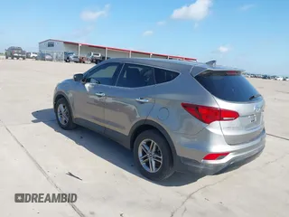 2017 Hyundai Santa Fe 2.4L z VIN 5XYZTDLB7HG444033, wystawiony jako IAAI lot #42263907 z przebiegiem 107 454 mil mil oraz . Historia ofert i sprzedaży dostępna na DreamBid. Obrazek 3.
