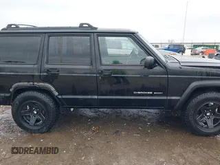 1999 Jeep Cherokee Sport with VIN 1J4FT68S6XL598558, listed as a IAAI auction lot 41549504 with 238,004 mi miles. Bid and sale history available at carsss.com. Image 13.