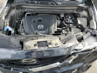 2019 Mazda CX-5 Grand Touring with VIN JM3KFBDM9K1650840, listed as a Copart auction lot 41929185 with 61,814 mi miles and Salvage Title. Bid and sale history available at carsss.com. Image 14.