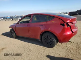 2024 Tesla Model Y Long Range with VIN 7SAYGDEE4RA257722, listed as a Copart auction lot 54577865 with 10,713 mi miles and Salvage Title. Bid and sale history available at DreamBid. Image 2.