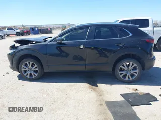2022 Mazda CX-30 S Select z VIN 3MVDMBBL7NM413447, wystawiony jako IAAI lot #41772804 z przebiegiem 69 102 mil mil oraz . Historia ofert i sprzedaży dostępna na DreamBid. Obrazek 14.