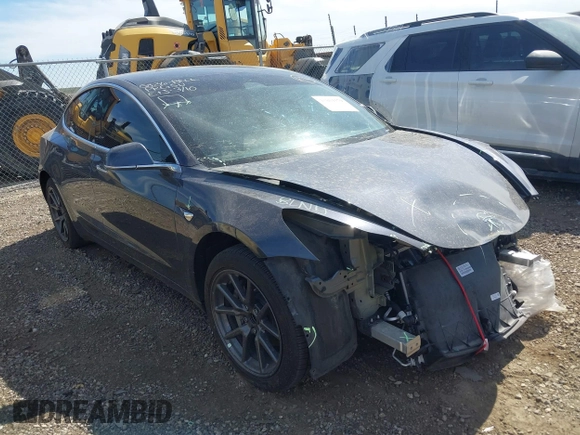 2019 Tesla Model 3 Mid Range with VIN 5YJ3E1EA5KF327679, listed as a IAAI auction lot 41804379 with 87,208 mi miles and . Bid and sale history available at DreamBid. Image 1.