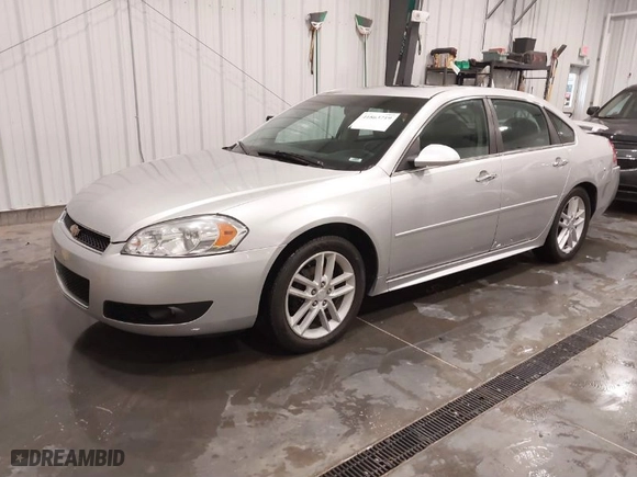 2013 Chevrolet Impala LTZ with VIN 2G1WC5E37D1241848, listed as a IAAI auction lot 41863719 with 167,482 mi miles. Bid and sale history available at carsss.com. Image 2.