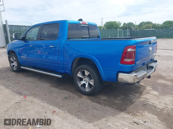 2021 Ram 1500 Laramie with VIN 1C6SRFJT1MN774879, listed as a IAAI auction lot 42242318 with 51,971 mi miles and . Bid and sale history available at DreamBid. Image 3.