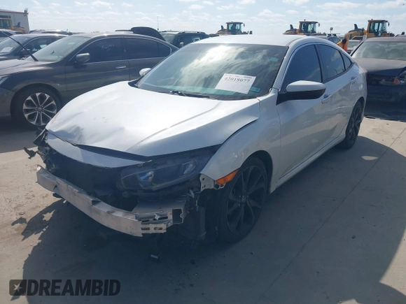 2019 Honda Civic Sport with VIN 19XFC2F81KE024702, listed as a IAAI auction lot 42018077 with 98,613 mi miles and . Bid and sale history available at DreamBid. Image 17.
