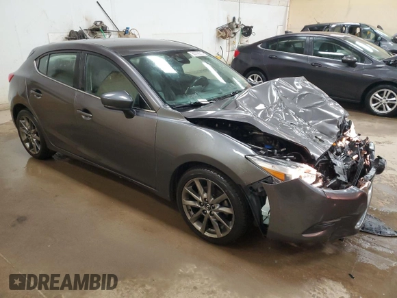 2018 Mazda 3 Touring with VIN 3MZBN1L34JM270270, listed as a Copart auction lot 80299014 with 123,789 mi miles and Salvage Title. Bid and sale history available at carsss.com. Image 4.