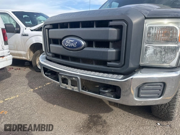2015 Ford F-250 XLT z VIN 1FT7X2B61FEC57669, wystawiony jako IAAI lot #42430375 z przebiegiem 141 252 mil mil oraz . Historia ofert i sprzedaży dostępna na DreamBid. Obrazek 10.
