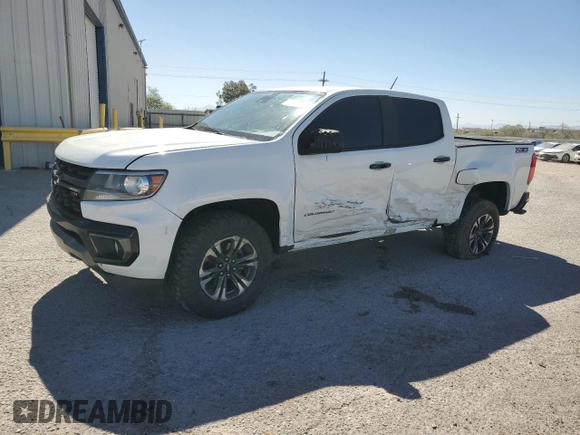 2021 Chevrolet Colorado 2WD Z71 with VIN 1GCGSDEN7M1201219, listed as a Copart auction lot 61310215 with 184,819 mi miles and Salvage title. Bid and sale history available at DreamBid. Image 1.