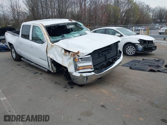 2018 Chevrolet Silverado 1500 LT with VIN 1GCUKREC0JF208509, listed as a IAAI auction lot 41794616 with 96,962 mi miles and . Bid and sale history available at DreamBid. Image 1.
