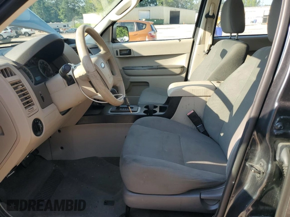 2009 Ford Escape XLS with VIN 1FMCU02739KD07929, listed as a Copart auction lot 64861745 with 144,914 mi miles and Clean title. Bid and sale history available at DreamBid. Image 7.