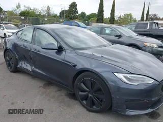2021 Tesla Model S Long Range с VIN 5YJSA1E57MF441387, выставлен на аукционе IAAI как лот 42034307 с пробегом Не указан миль и . История ставок и продаж доступна на DreamBid. Изображение 13.
