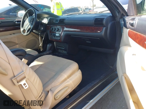 2002 Chrysler Sebring Limited with VIN 1C3EL65R72N233892, listed as a IAAI auction lot 41338296 with 120,875 mi miles and . Bid and sale history available at DreamBid. Image 5.