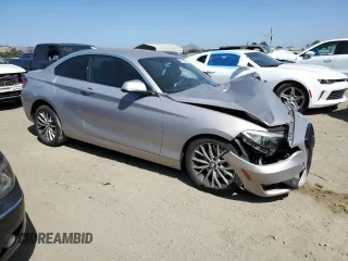 2016 BMW 2 Series 228i with VIN WBA1F9C53GV545568, listed as a Copart auction lot 60629805 with 67,530 mi miles and Salvage title. Bid and sale history available at DreamBid. Image 4.