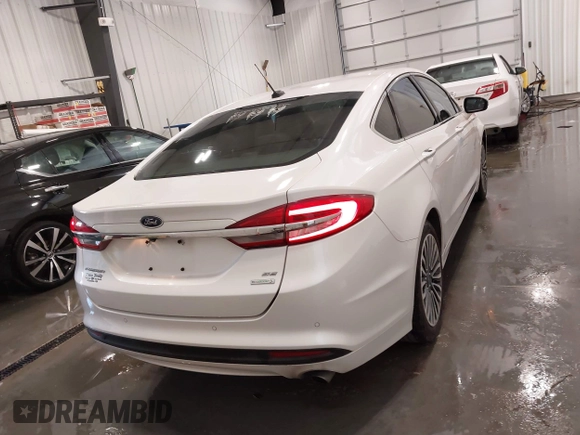 2017 Ford Fusion SE z VIN 3FA6P0HD5HR367474, wystawiony jako IAAI lot #42179210 z przebiegiem 81 852 mil mil oraz . Historia ofert i sprzedaży dostępna na DreamBid. Obrazek 17.