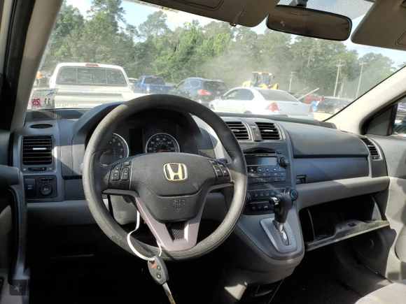 2009 Honda CR-V EX z VIN 3CZRE38579G701101, wystawiony jako Copart lot #57103865 z przebiegiem 2 984 mil mil oraz Szkoda całkowita • Salvage title. Historia ofert i sprzedaży dostępna na DreamBid. Obrazek 8.
