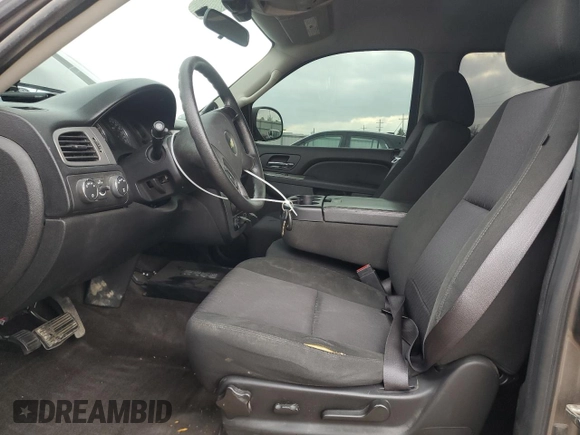 2012 Chevrolet Tahoe Commercial with VIN 1GNSK2E07CR324903, listed as a Copart auction lot 80266624 with 131,700 mi miles and Salvage title. Bid and sale history available at DreamBid. Image 7.