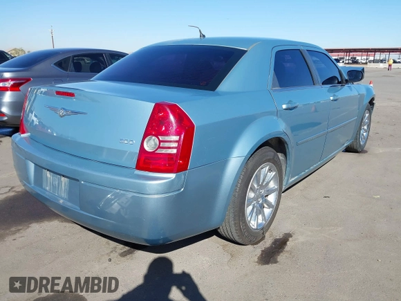 2008 Chrysler 300 LX with VIN 2C3KA43R08H267996, listed as a IAAI auction lot 41651603 with 188,760 mi miles. Bid and sale history available at carsss.com. Image 4.