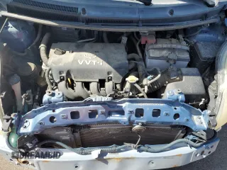 2008 Toyota Yaris with VIN JTDJT923185164654, listed as a Copart auction lot 54052575 with 242,505 mi miles and Salvage Title. Bid and sale history available at DreamBid. Image 11.