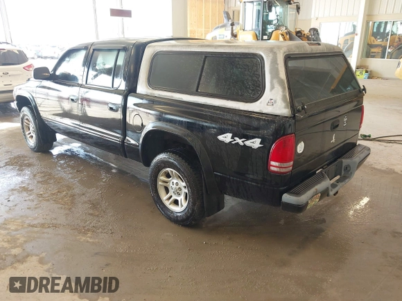 2004 Dodge Dakota Sport with VIN 1D7HG38N24S501391, listed as a IAAI auction lot 41736751 with 213,299 mi miles and . Bid and sale history available at carsss.com. Image 3.