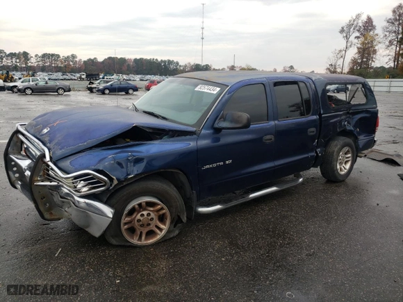 2001 Dodge Dakota Sport with VIN 1B7HL2AN41S258253, listed as a Copart auction lot 82574434 with 0 mi miles and Salvage Title. Bid and sale history available at carsss.com. Image 1.